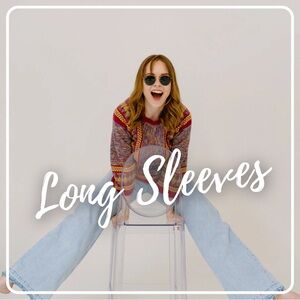 Shop long sleeve tees, sweatshirts, and blouses below!